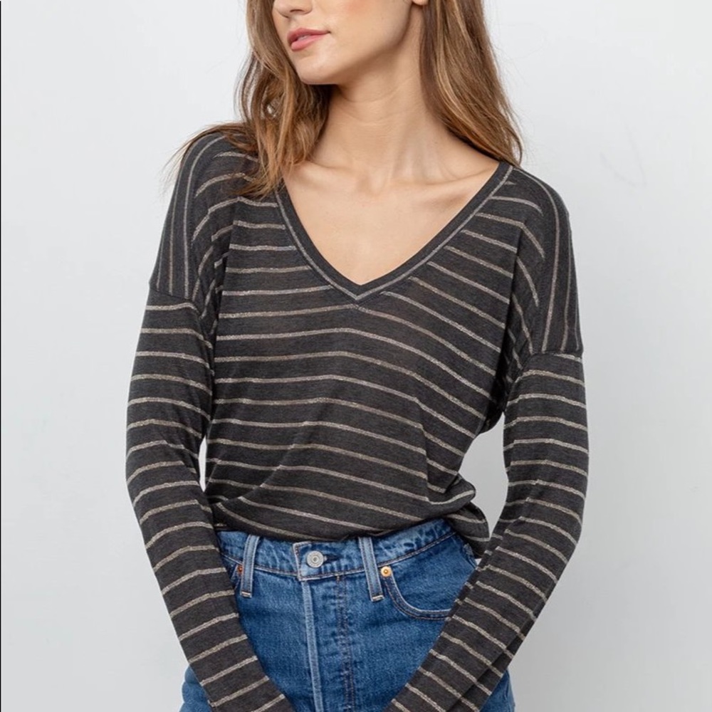 Rails Charcoal Sami dark grey with gold stripes.
